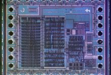 A microchip and circuit board in close view