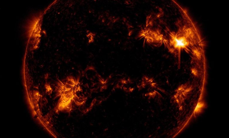 the Sun erupting with a bright solar flare