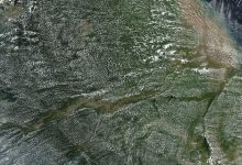 aerial view over dense rainforest canopy